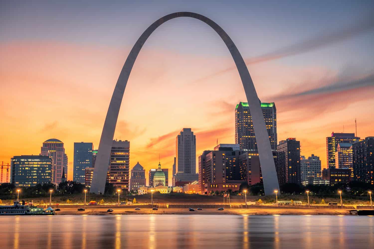 St. Louis, Missouri, USA downtown cityscape on the river at dusk.