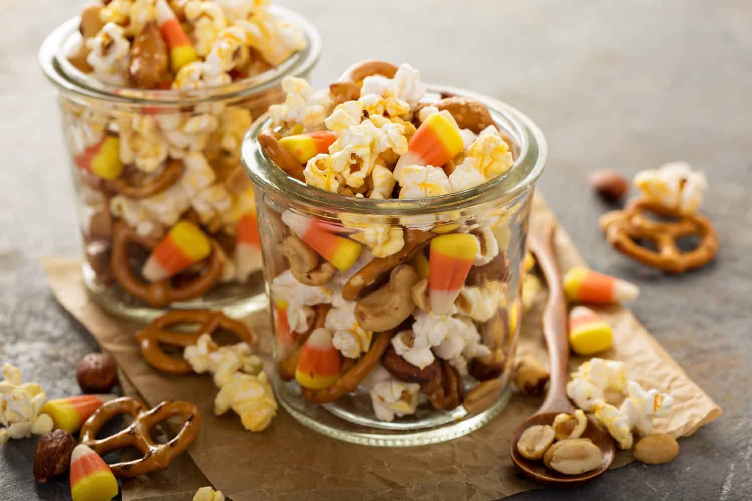 Homemade Halloween trail mix with candy corn, popcorn and pretzels