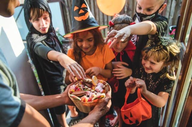 Children celebrate Halloween dressed up in costumes. Selective focus. Kids.