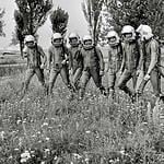 Cosmonauts Walk Through a Field After Training