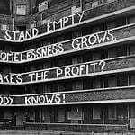 Housing Protest Message Across an Apartment Block