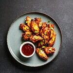 Elevate Your Wing Game at These 8 Unbeatable Spots