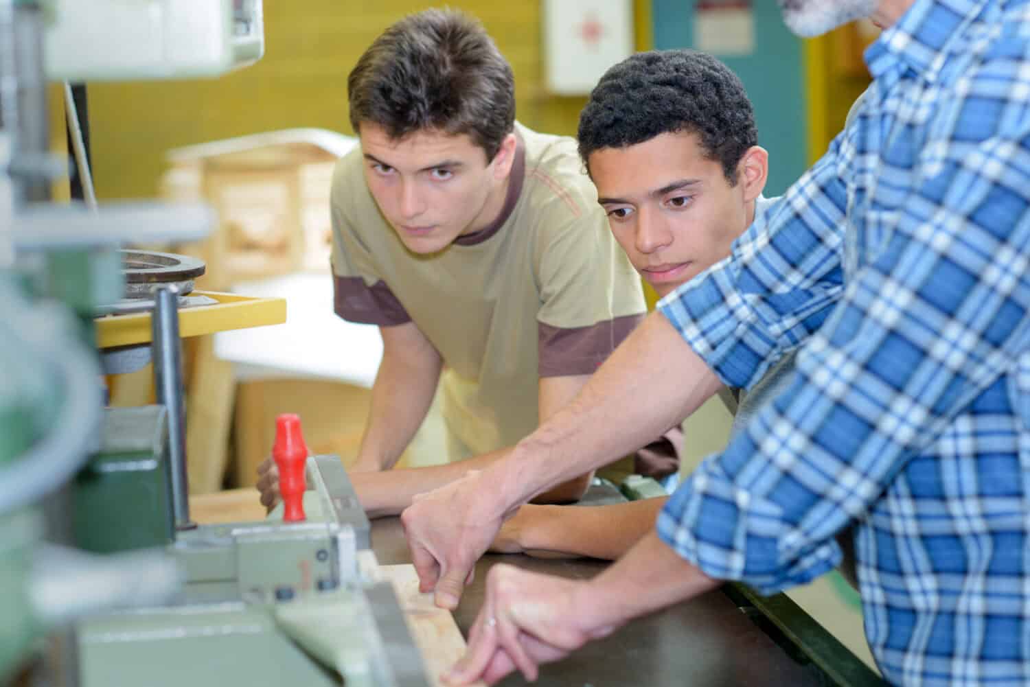 students watching teacher in craft class