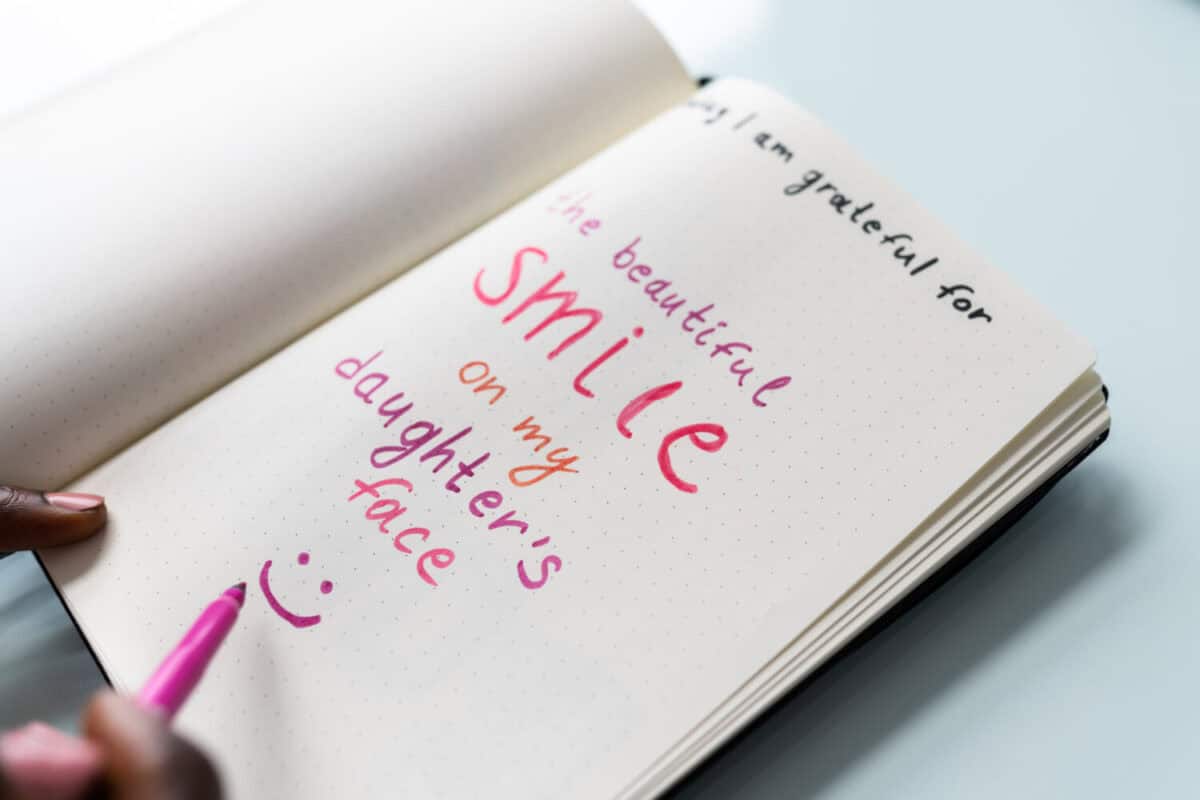 African American Women Writing In Gratitude Journal