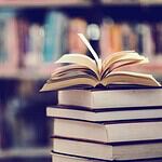 Holding Books With Arms Extended