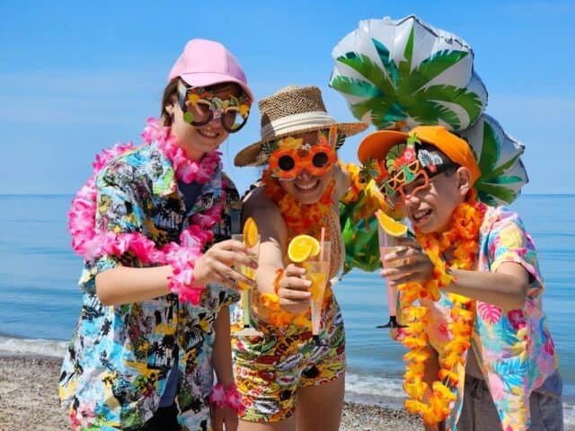 tropical birthday, family party, kids birthday, mom with kids, fun, luau party, tropical beach party, sunset, funny masks, fruit cocktails