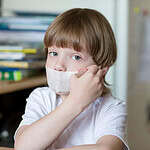 Covering the Mouth With Tape