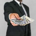 Slipping someone a cash bonus on the spot