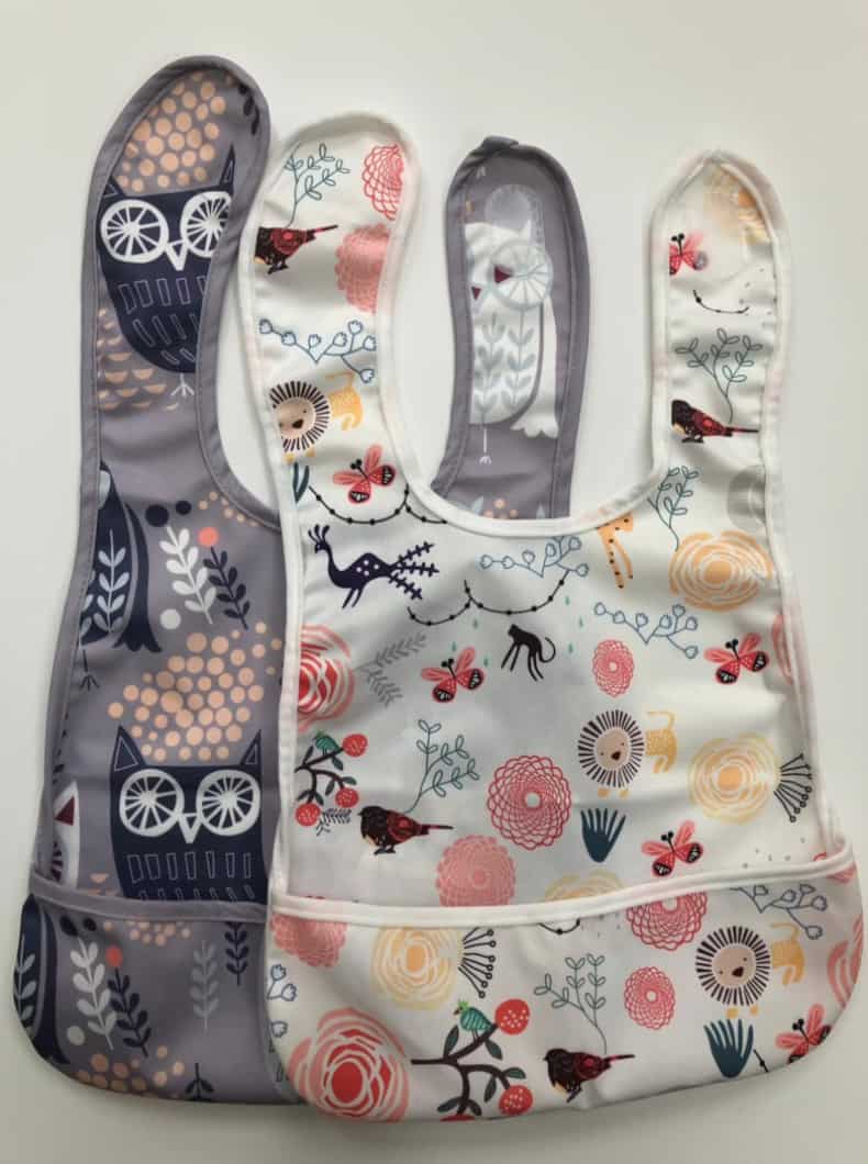 Baby bibs from Etsy are a great addition to the diaper bag checklist.