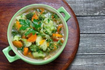 Vegetable soup with cabbage, broccoli, potatoes and carrots