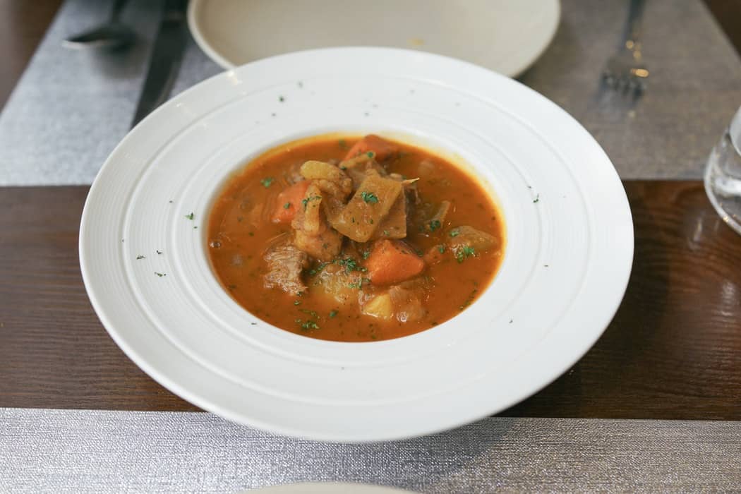 beef stew served on dish, Zhangjiagang Suzhou Food Images & Pictures Bowl Soup Meal Warm Filling Carrot Potatoe Indoor Beef Lunch Curry Dish Soup Bowl Plate