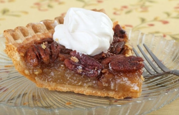 Pecan Pie topped with Whipped Cream