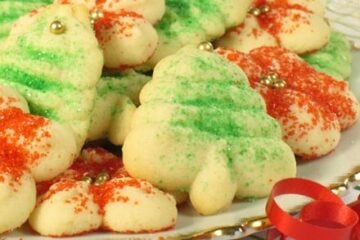 Cream cheese spritz cookies decorated for Christmas