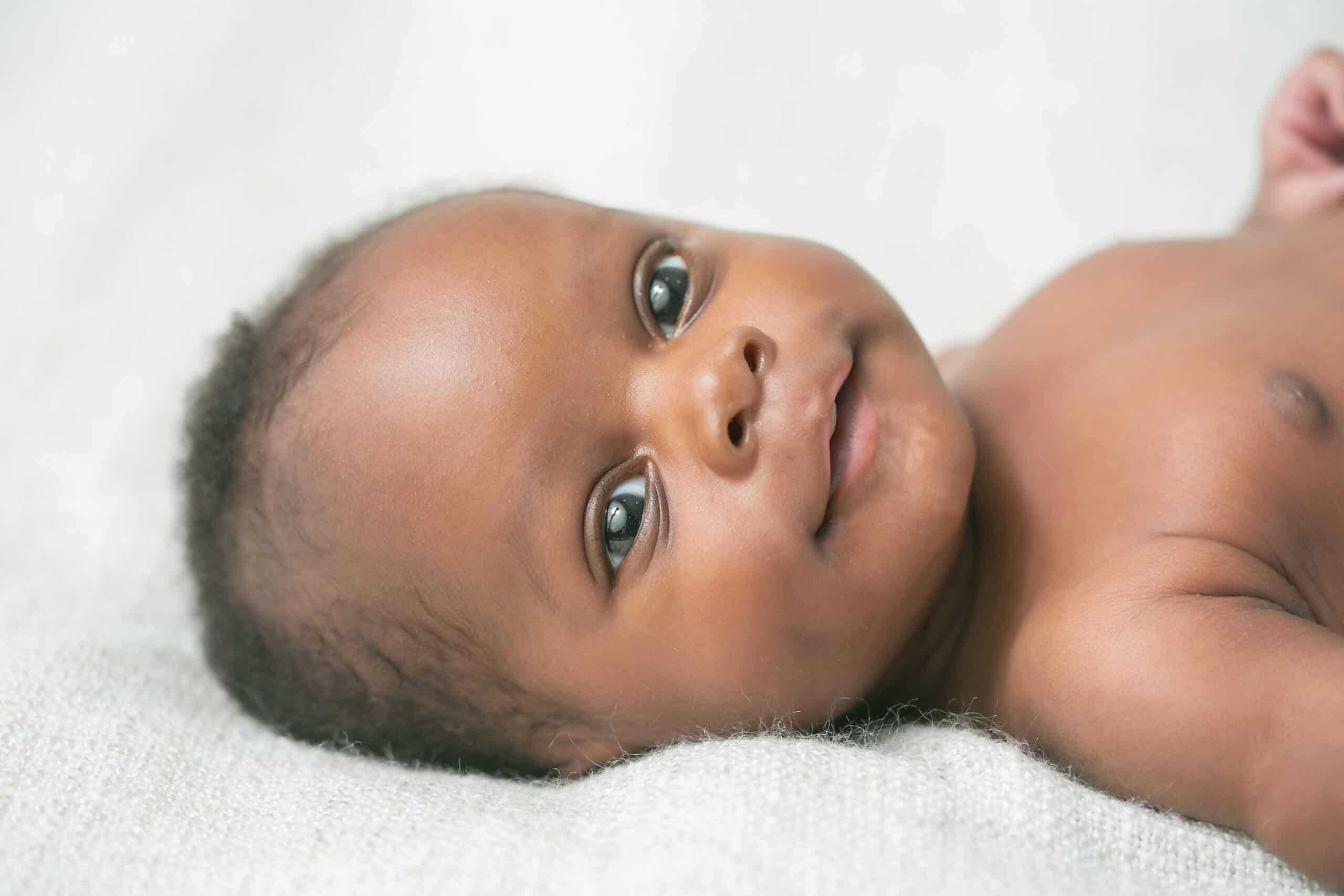 Cute baby smiling at the camera