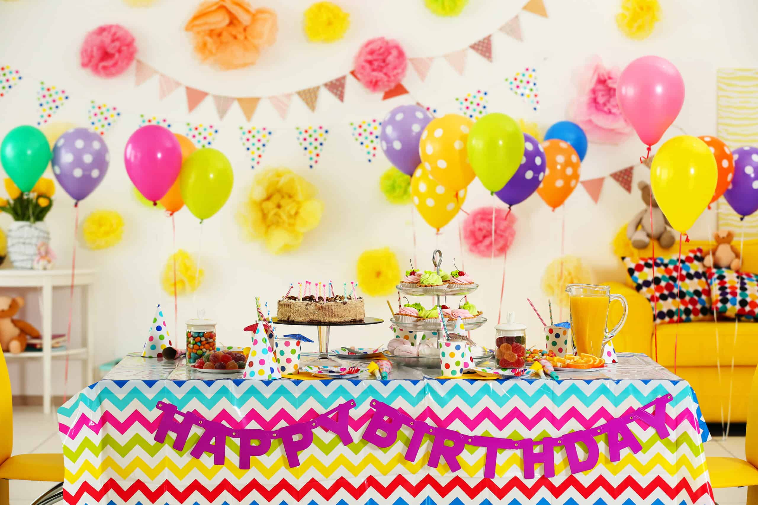 Colorful table set up for birthday party.