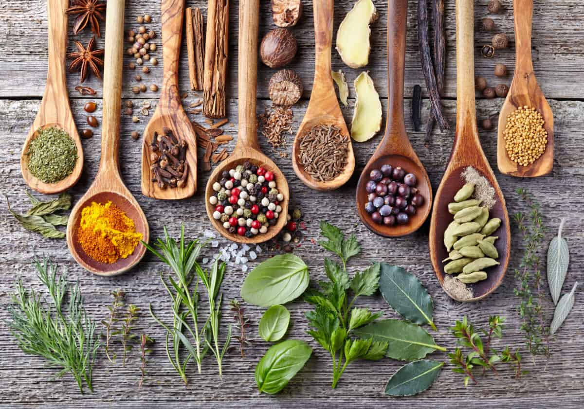 Five-Spiced Turkey uses a blend of spices and herbs, like these wooden spoonfuls