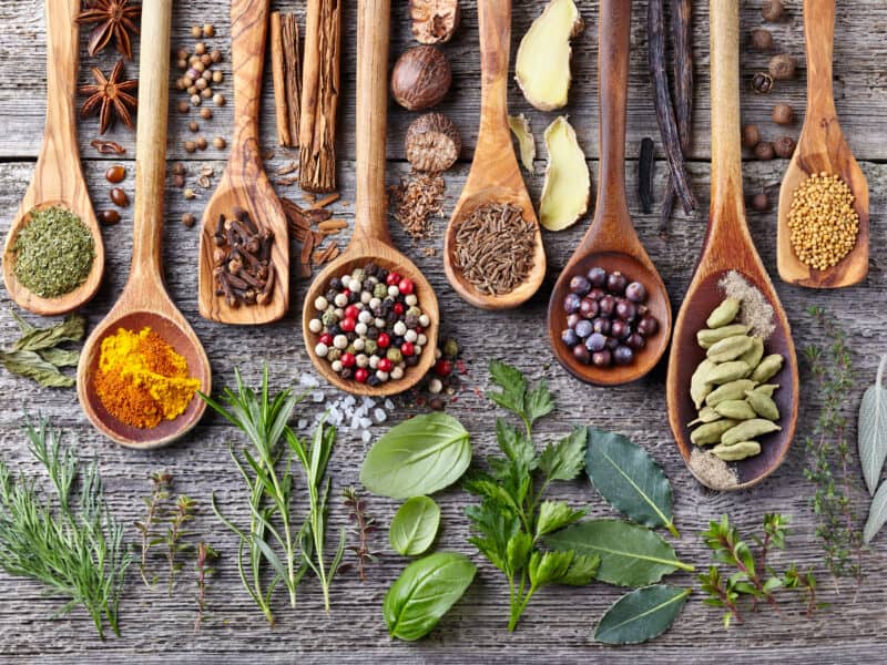 Five-Spiced Turkey uses a blend of spices and herbs, like these wooden spoonfuls