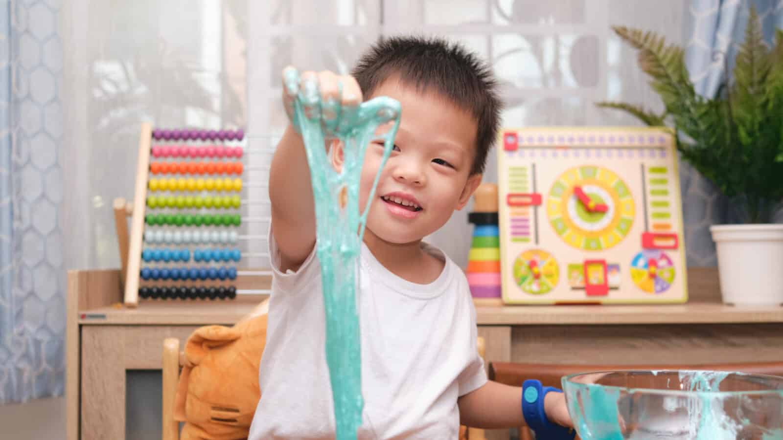 child playing with slime
