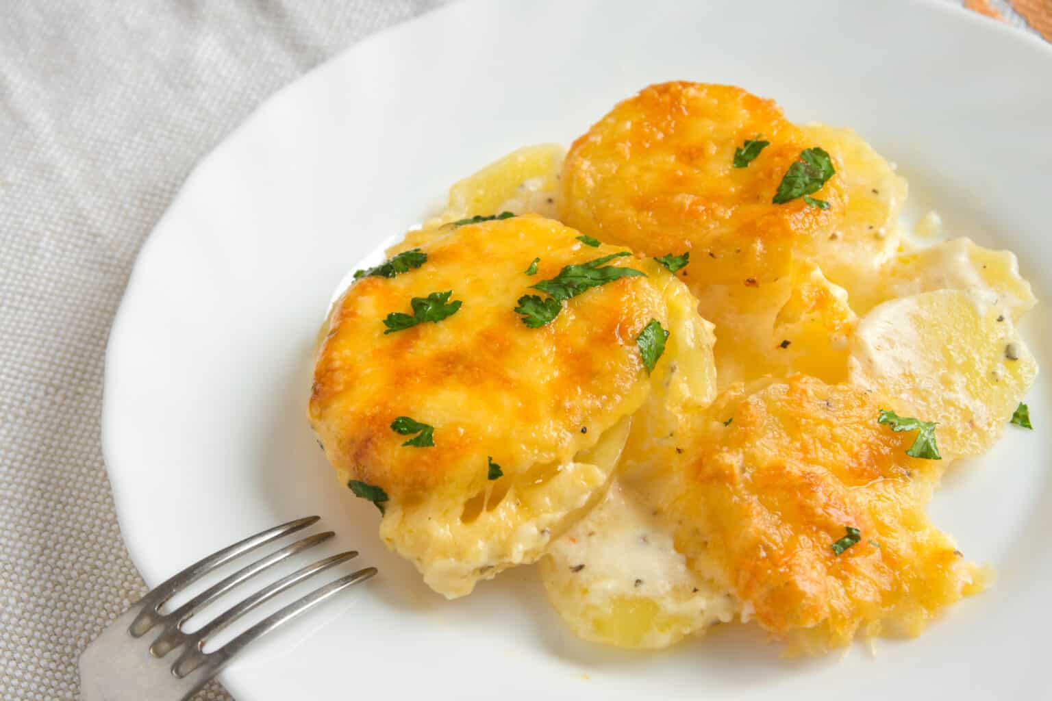 Scalloped Potatoes vs. Au Gratin: Two Unique Differences & Which Has