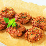 Fried vegetable burgers on baking parchment paper