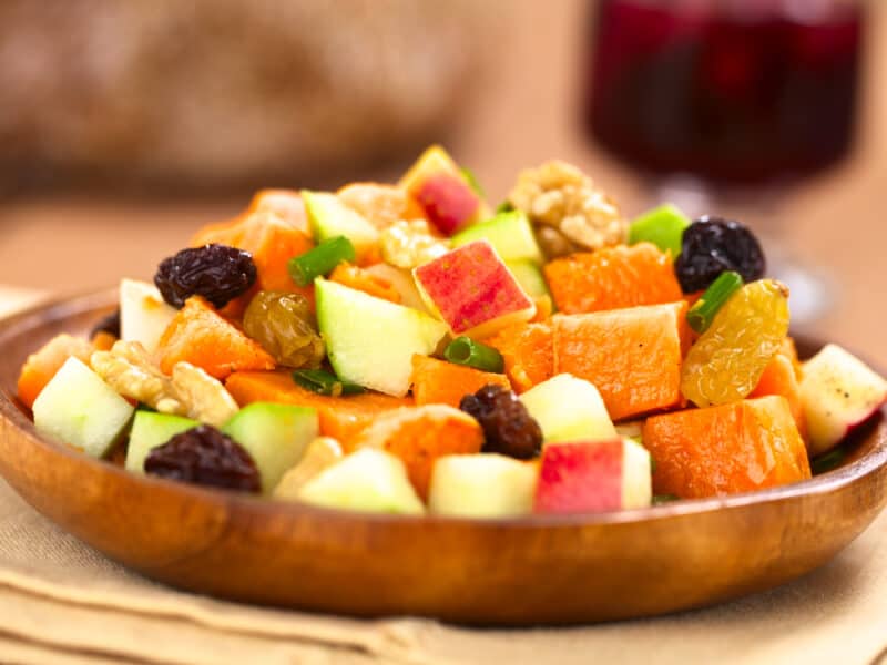 Fruited Sweet Potatoes - serving dish of sweet potatoes with a variety of cut fruit