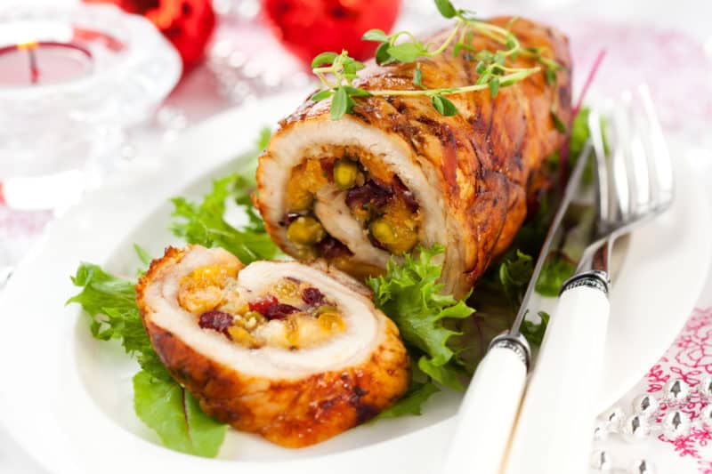 Cranberry-Stuffed Turkey Breasts, sliced and ready to serve